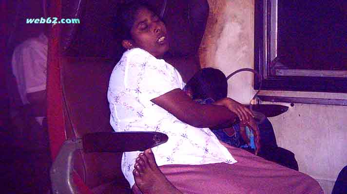 woman on a train in Sri Lanka